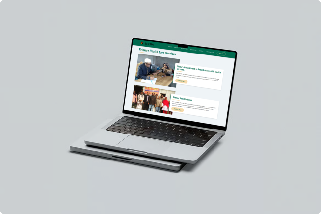 Website homepage displayed on a laptop screen showcasing a responsive web design